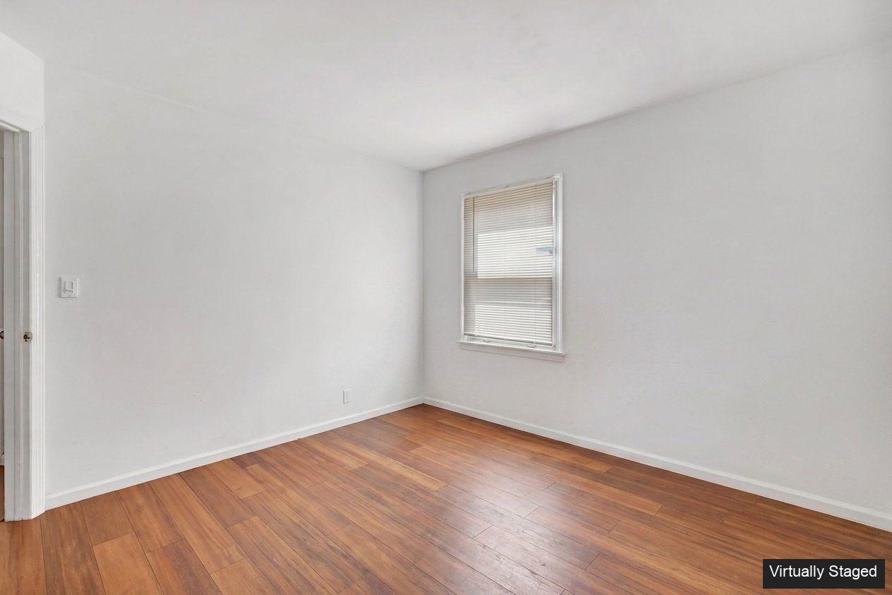 Bethel CT primary bedroom, another angle before virtual staging