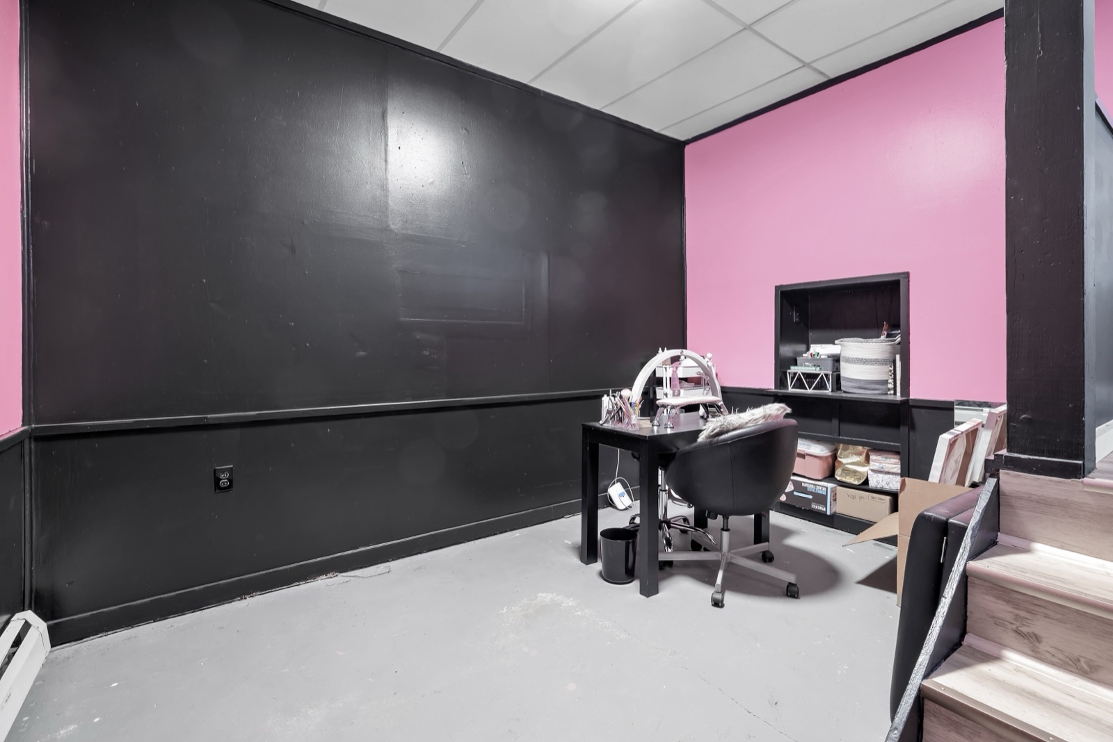 Cluttered Naugatuck CT game room before destaging and virtual staging