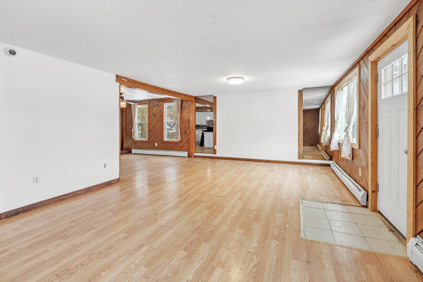 Empty Naugatuck CT living room wide angle before virtual staging