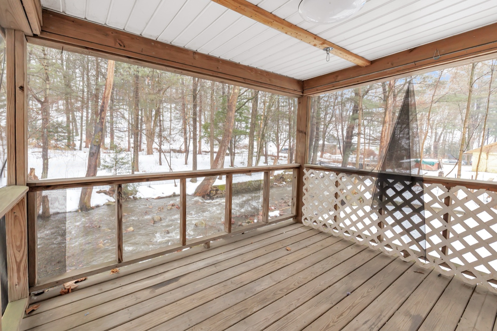 Empty Naugatuck CT screened porch before virtual staging