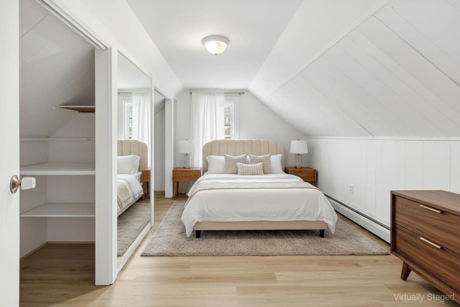 Naugatuck CT upstairs bedroom after virtual staging with bed and nightstands
