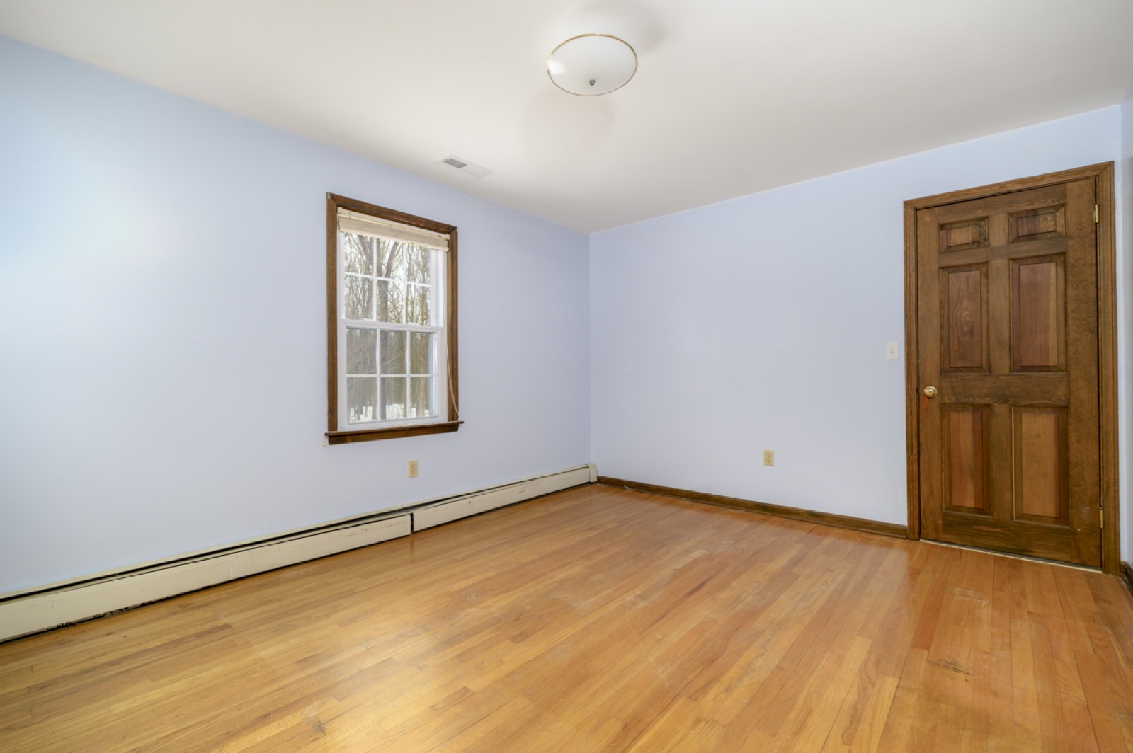 Empty Naugatuck CT smaller bedroom before virtual staging as kids room