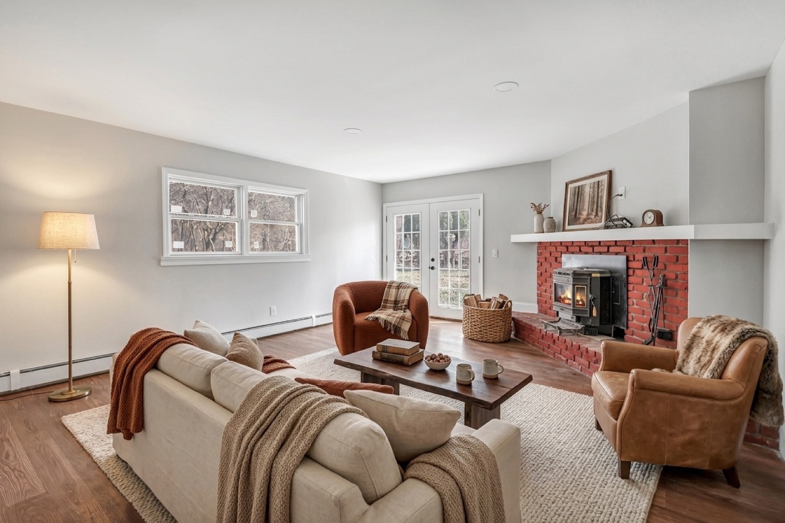 New Milford CT den after virtual staging with seating and fireplace