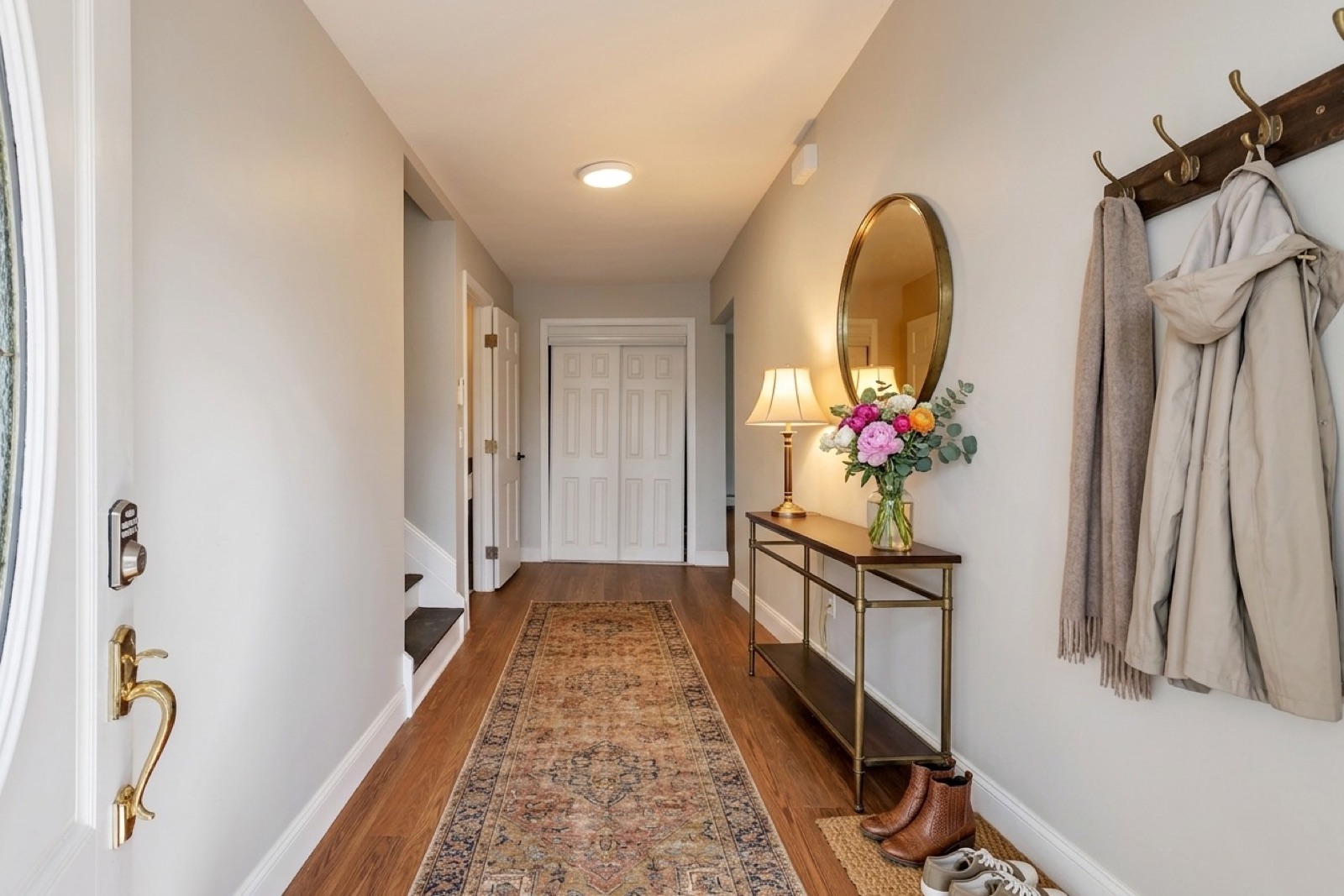 New Milford CT foyer after virtual staging with console and mirror
