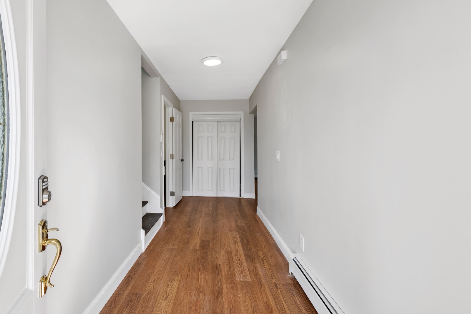 Empty New Milford CT foyer before virtual staging