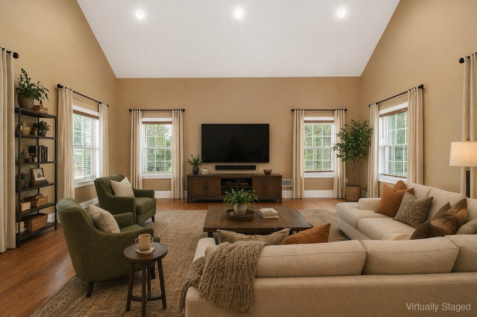 Stamford CT great room after virtual staging as a media lounge with sectional and bookshelf