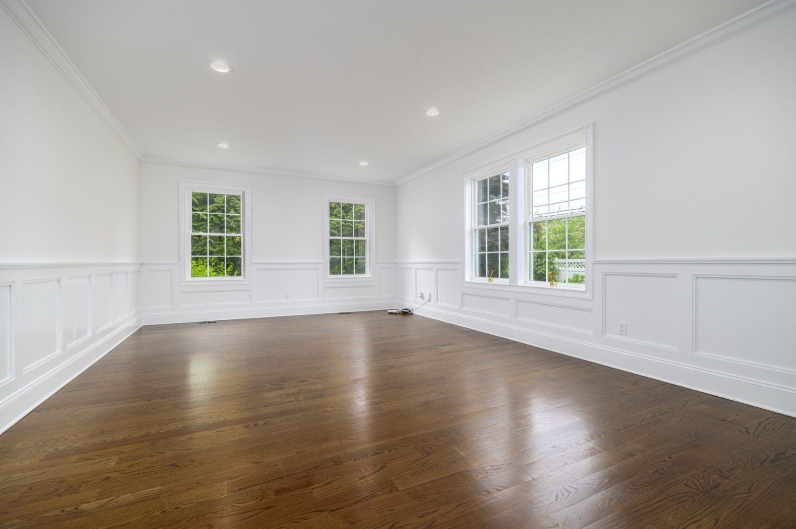 Empty Stamford CT formal living room before virtual staging